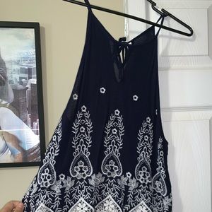 Navy blue embroidered shirt.